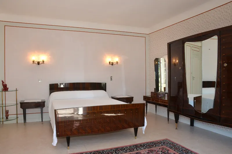 Double bedroom with Art Deco rosewood furniture and a double bed
